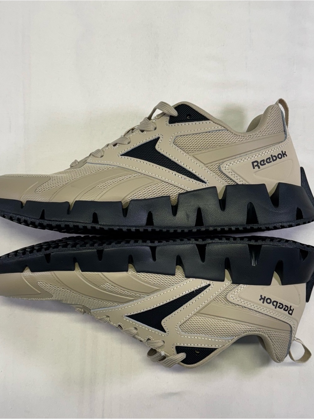 Reebok Beige and Black Zig-Style Athletic Shoe